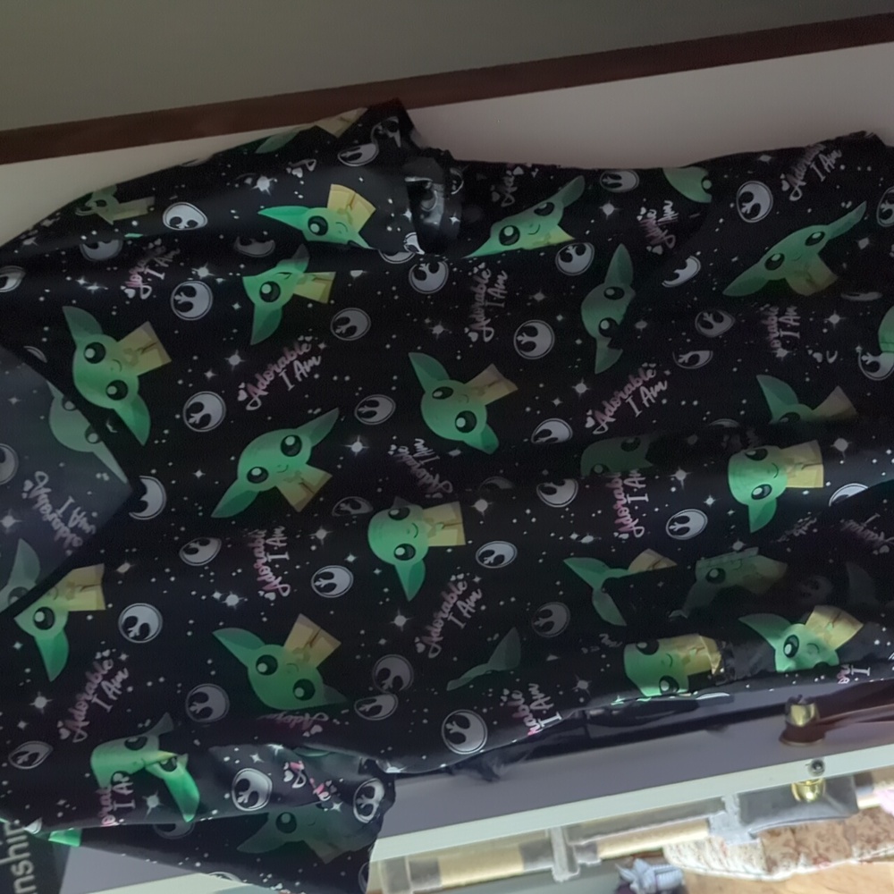 Women's Grogu scrub top.